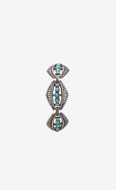 Western-style bracelet with mini cabochons in metal and turquoise.